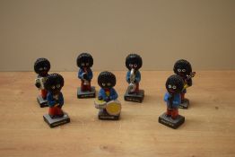 A group of seven vintage Robertson Jam band figures.