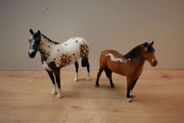 Two Beswick Pottery horse studies comprising Appaloosa Stallion model number 1772 (2nd) designed