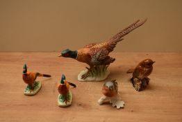 A pair of Beswick Pottery Pheasants (First Version) model number 767A designed by Mr Watkin in