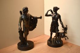 A pair of appealing reproduction cast patinated metal studies depicting Athena/Diana and Apollo,