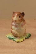 A Beswick Pottery Beatrix Potter 'Timmy Willie' from 'Johnny Town-Mouse' study with gold back