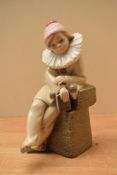 A Lladro porcelain figurine 'Little Jester' model number 5203, complete with box.