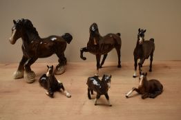 A group of six Beswick Pottery horses and foals including 'Cantering Shire' model number 975