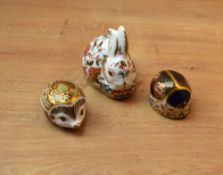 A group of three Royal Crown Derby bone china paperweights, comprising 'Ivy', 'Meadow Rabbit' and '