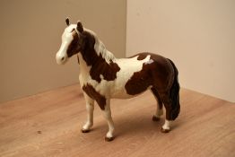 A Beswick Pottery Skewbald Pinto Pony, model number 1373 (First Version), designed by Arthur