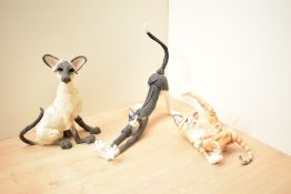 A group of three Country Artists 'Two A Breed Apart' Cat studies, in three poses.