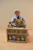 A Royal Doulton bone china figure 'The China Repairer' HN 2943.