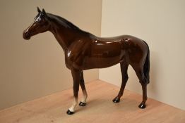 A Beswick Pottery Large Racehorse model number 1564 designed by Arthur Gredington in brown gloss