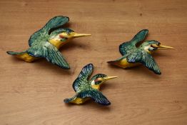 A set of three graduated Beswick Pottery Kingfisher wall plaques, model numbers 7291-, 729-2 and