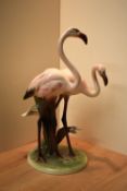 A continental 'Keramos' porcelain animal study depicting two flamingos, signature to underside,
