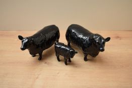 A Beswick Pottery Aberdeen Angus trio comprising Aberdeen Angus Bull model number 1562, Aberdeen