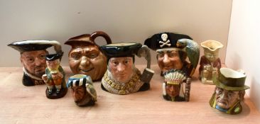 An assortment of Royal Doulton bone china and similar Toby character jugs to include 'North American