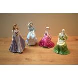 A group of four Coalport bone china figurines comprising 'Fascination', Debutantes 'Emily', '