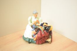 A Royal Doulton bone china figurine 'The Wardrobe Mistress' HN 2145.