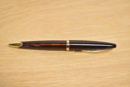 A boxed Waterman Carene ballpoint pen in Amber laque with gold trim