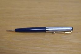 A Parker 17 Propelling pencil in Blue witha chrome cap with gold trim