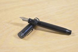 A Parker Duofold Senior button fill fountain pen in Black with single wide cap band Parker Duofold