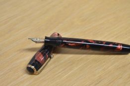 A Parker Duofold Callenger Standard button fill fountain pen in Red and Black marble with three