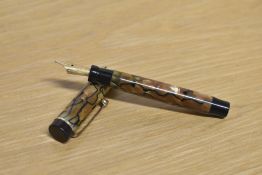 A Parker Duofold Junior button fill fountain pen in Black and Pearl with three narrow cap bands