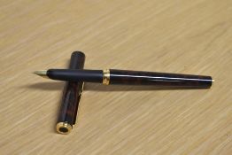 A Parker 95 converter fill fountain pen in Laque Thuya having Parker nib