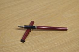 A Sheaffer TRZ Targa slim in burgundy with gold trim having Sheaffer nib