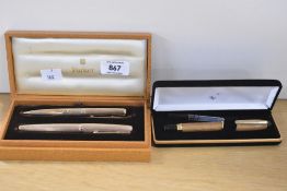 A boxed Parker 61 capillary fill fountain pen and propelling pencil in the Perle pattern.