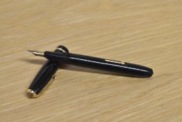 A Conway Stewart Dinkie 550 lever fill fountain pen in Black with a single cap band having Conway