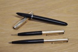 A boxed Parker 51 aerometric fountain pen, propelling pencil and ballpoint pen in Black with