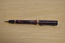 A Parker Duofold rare push top Ballpoint pen in Maroon Marble