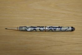 A Parker Duofold ring top propelling pencil in Black and Pearl having three narrow band. One cap