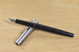 A Parker 15 converter fill fountain pen in black with stainless steel cap