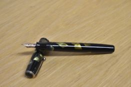 A Parker Duofold Deluxe Challenger Standard button fill fountain pen in Green and Black marble
