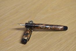 A Parker Duofold Junior button fill fountain pen in Black and Pearl with three narrow cap bands