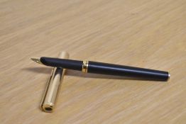 A Parker 95 converter fill fountain pen in Matte Black with gold cap having Parker nib