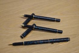 Two Parker Rialto converter fill fountain pens and a rollerball pen in Laque Aqua