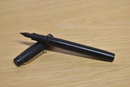 An Onoto Self Filler Stylo pen in black
