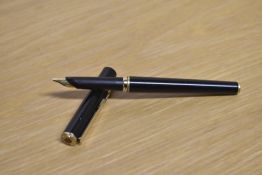 A Parker 95 cartridge fill fountain pen in Black with gold trim having Parker nib