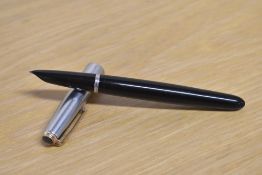 A Parker 51 vacumatic fill fountain pen in Black with lustraloy cap with gold blue diamond clip