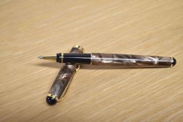 A boxed Kingsley rollerball pen in green marble