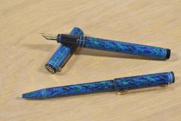 A Waterman Forum cartridge fill fountain pen and Ballpoint pen in Blue & Green having Waterman