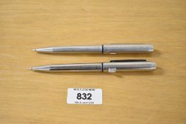 Two Parker 25 MkII ballpoint pens in stainless steel flighter with blue insets
