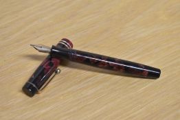 A Parker Duofold Junior button fill fountain pen in Burgundy and Black marble with two narrow cap