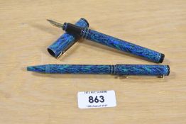 A Waterman Forum cartridge fill fountain pen and Ballpoint pen in Blue & Green having Waterman
