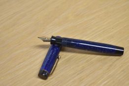 A Parker Duofold Junior button fill fountain pen in Lapis Lazuli Blue with two narrow bands to the