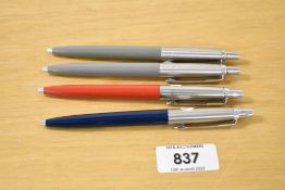 Four Parker Jotter 1972 decimalisation conversion ballpoint pens two in grey, a red and a blue
