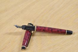 A Waterman Expert cartridge/ converter fill fountain pen in Flame Red laque having Waterman France M