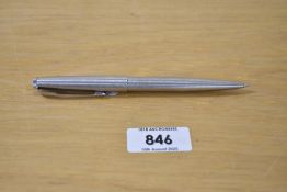 A Parker 45 propelling pencil in stainless steel (engraved RMJ)