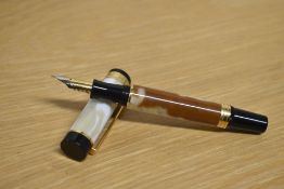 A boxed Sigma converter fill fountain pen in White Coconut having Iridium Point Germany nib