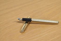 A boxed Sheaffer Prelude converter fill fountain pen in Barleycorn pattern having Sheaffer M nib