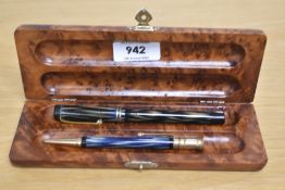 A boxed Parker Duofold True Blue Lucky Curve button fill fountain pen and Propelling pencil in